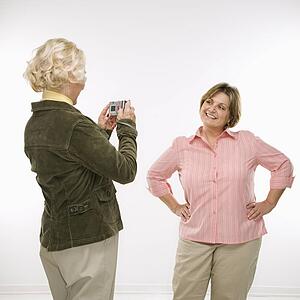Woman taking photo of woman