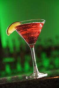 martini cocktail with fruit garnish 