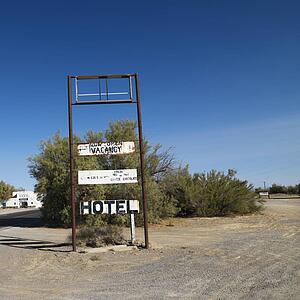 Run down hotel sign