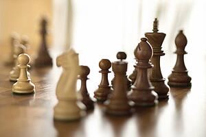 Chess pieces on chess board