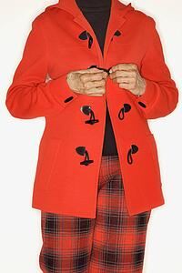 Female buttoning coat