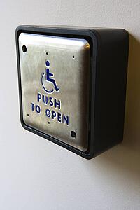 Metal door entrance button for physically challenged or handicapped people