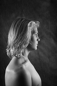 Male teen profile with bare chest