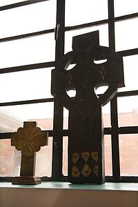 Celtic crosses sitting on windowsill
