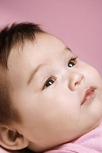 Close up of Asian babys face.