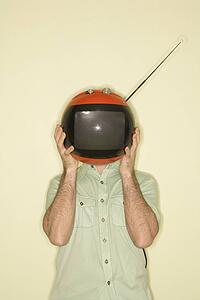 Man holding round red retro television in place of head