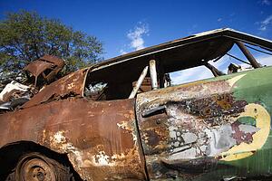 Old abandoned and rusted car