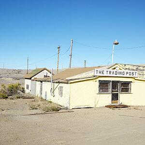 Old trading post in desert landscape of Utah