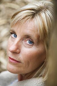 Head shot of middle-aged Caucasian woman.