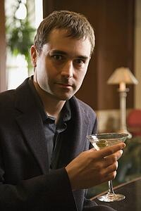 Man holding martini 