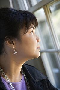 Woman gazing out window