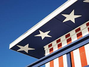 Close-up of lifeguard tower painted red, white and blue with stars and stripes in Miami, Florida, USA
