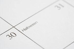 Close up of calendar displaying Halloween