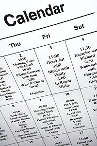 Close-up of calendar of events at retirement community center