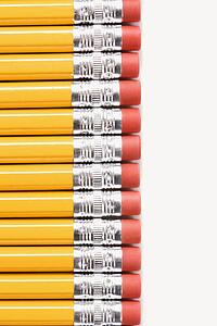 Eraser ends of group of pencils lined up in an even row.