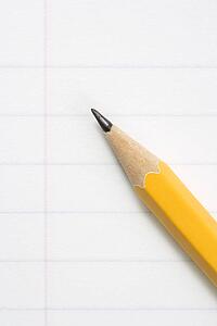 Close up of pencil on notebook paper