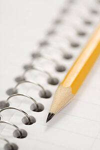 Pencil on top of spiral bound notebook