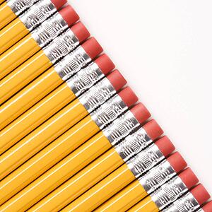 Eraser ends of group of pencils lined up in an even diagonal row 