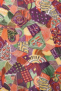 Close-up of colorful vintage fabric with abstract shapes printed on polyester