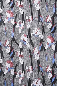 Close-up of vintage fabric with abstract flowers printed on polyester