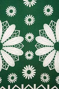 Close-up of vintage fabric with white daisy pattern