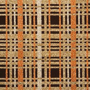 Close-up of woven vintage fabric with brown and gold crossbar pattern