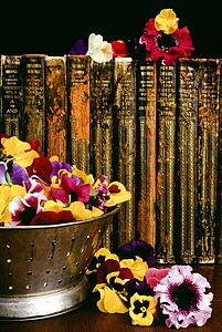 Historic books and floral arrangement