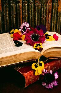 Historic books and floral arrangement