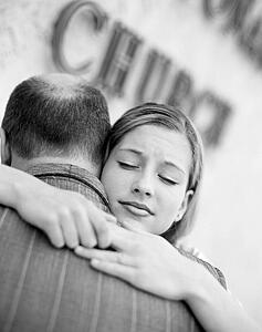 Daughter hugging father