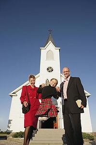 A family coming home from church