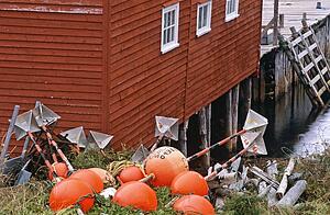 Buoys beside boathouse, Salvage, Newfoundland, Canada