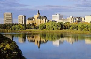 Downtown Saskatoon reflected in the South Saskatchewan river
