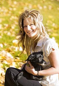 Woman holding a dog