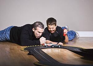 Father and son playing together