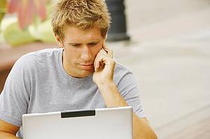 Man behind a laptop