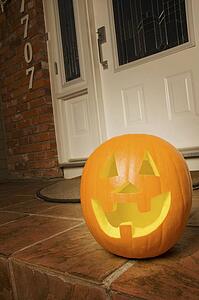 Pumpkin sitting on door step