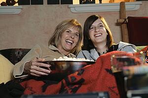 Two women watching a movie