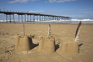 Sand castles by the pier, Saltburn, North Yorkshire, UK