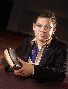 Man holding a Bible