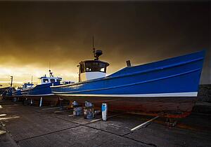 Fishing boats out of the water for winter, Seahouses, Northumberland, England