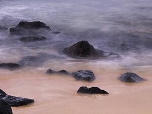 Rocks in the water and on the beach, Poipu, Kauai, Hawaii
