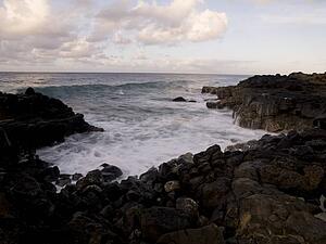 Rocks on water's edge, Kauai, Hawaii