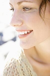 Close-up portrait of smiling female
