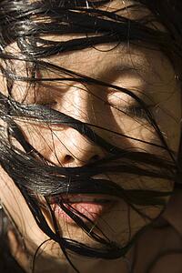 Female's face with wet hair