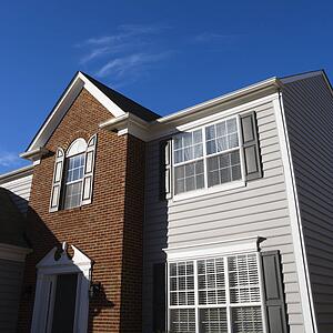 Exterior of brick and vinyl siding house
