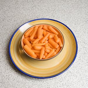 Bowl of carrots on counter