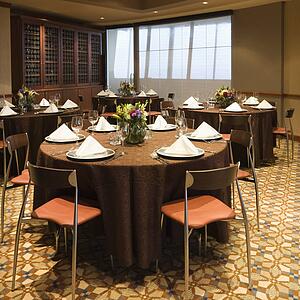 Restaurant interior with table setting and chairs