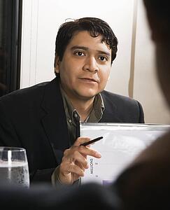 Businessman in meeting with charts