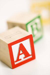 Selective focus of alphabet blocks.