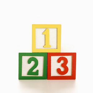 Numbered toy blocks in a stack